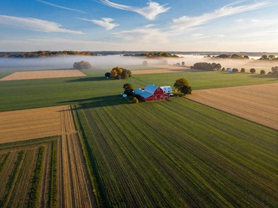 Aerial view of American farmland with red barn - Farmstead Singles farmer dating site