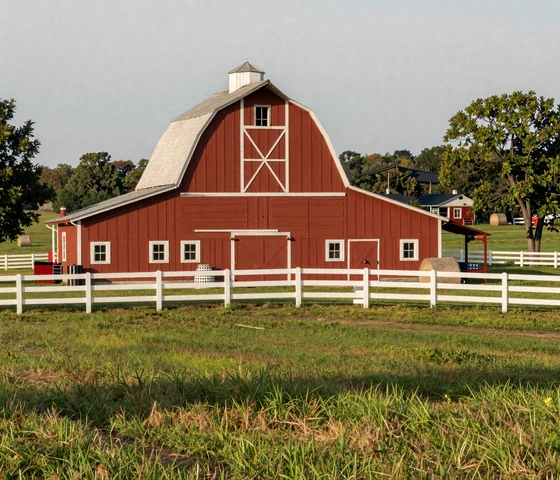 Red barn surrounded by green rolling farmland in rural Ohio Amish country, representing Ohio farmers dating lifestyle